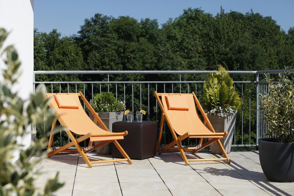 Mysky Hotel Pulheim Exteriör bild